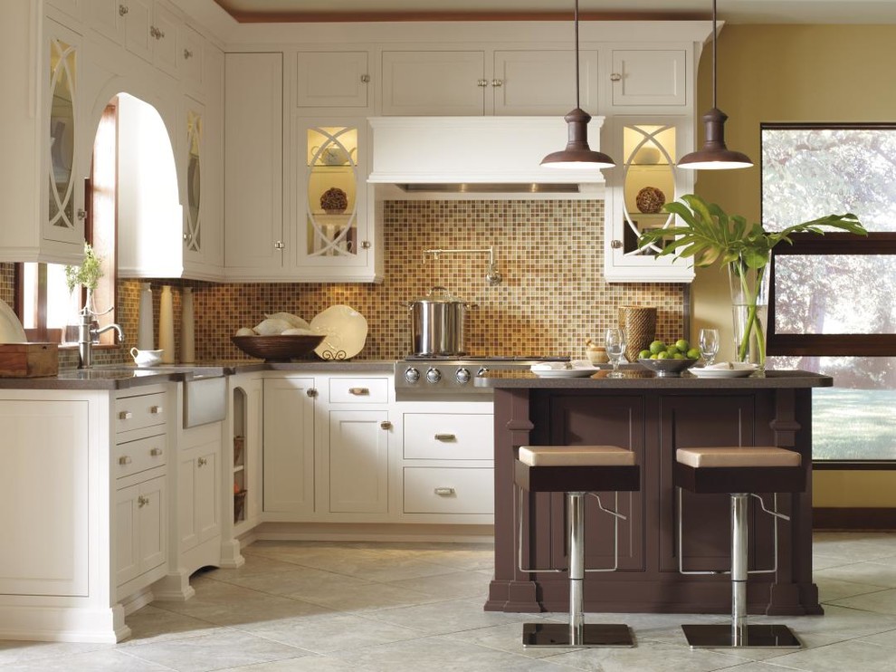 Design ideas for a traditional kitchen in Other with white cabinets.