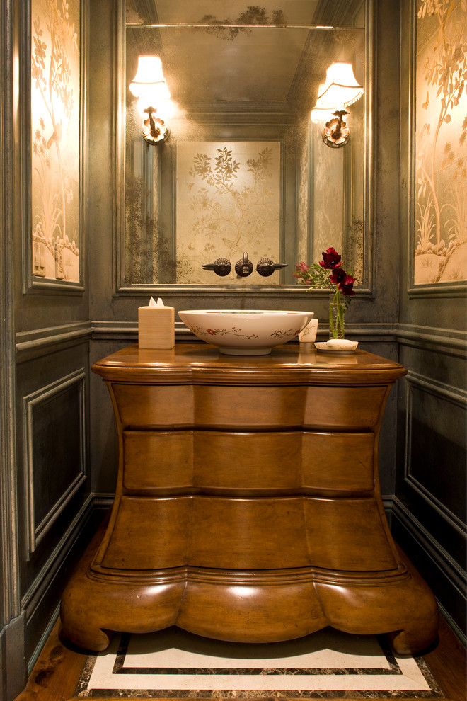 Design ideas for a traditional powder room in Orange County with a vessel sink.