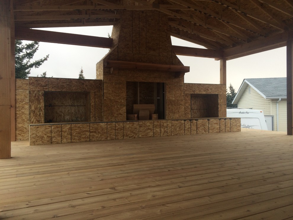 Example of a mountain style home design design in Calgary