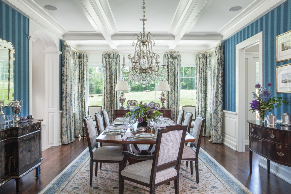 Inspiration for a traditional separate dining room in Boston with blue walls and dark hardwood floors.