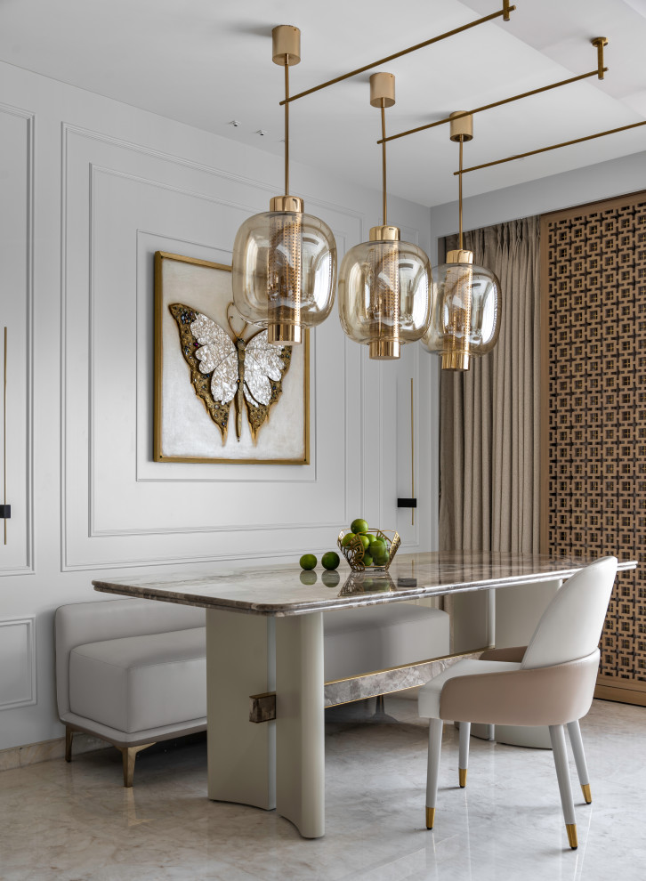 Design ideas for a contemporary dining room in Mumbai.