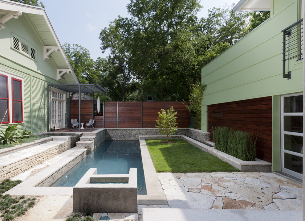 Design ideas for a contemporary courtyard lap pool in Austin.