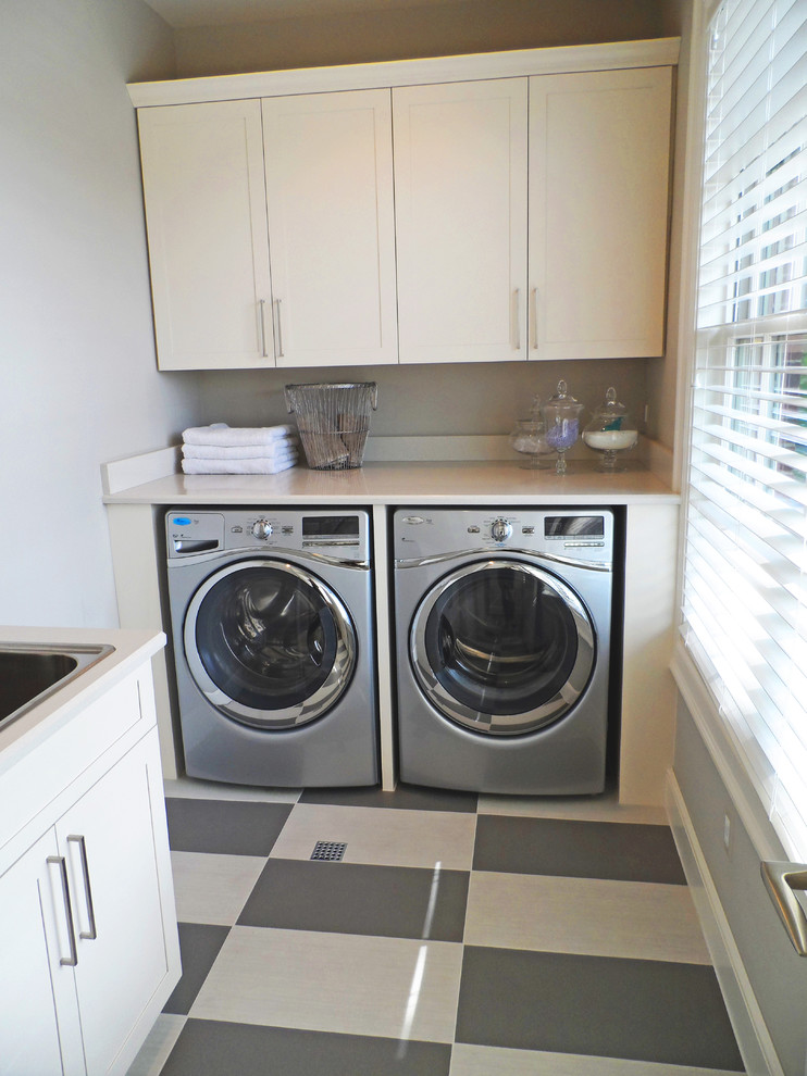 Design ideas for a transitional laundry room in Detroit.