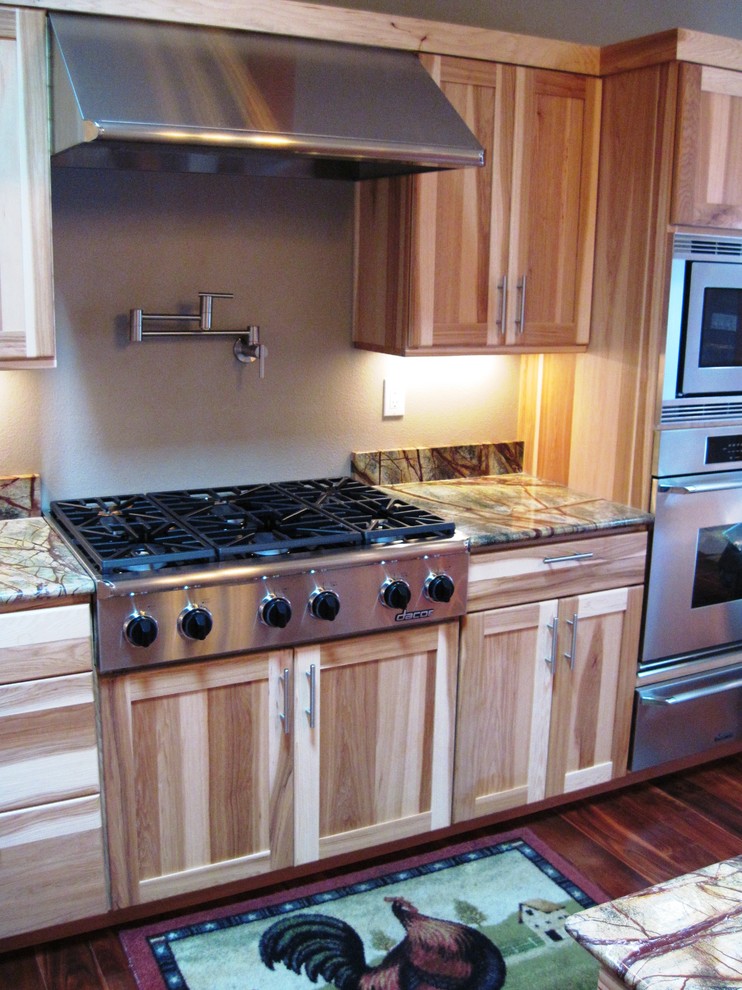 Inspiration for a large transitional dark wood floor kitchen remodel in Seattle with an undermount sink, shaker cabinets, light wood cabinets, marble countertops and stone slab backsplash
