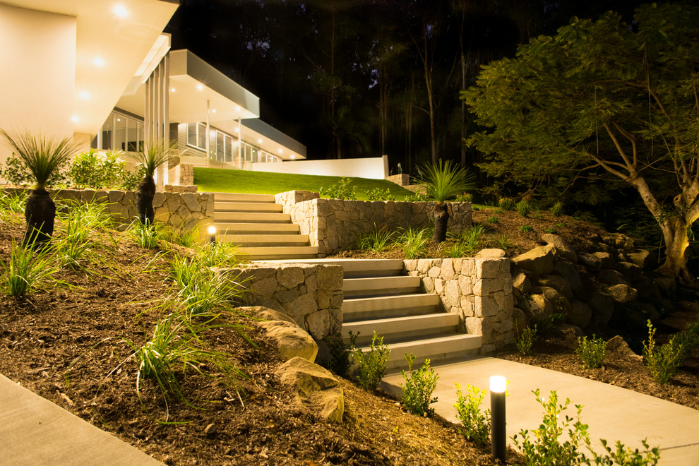This is an example of a contemporary garden in Sunshine Coast.