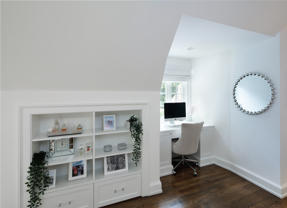 Built in Desk - Example of a bedroom and large minimalist girl medium tone wood floor, brown floor and vaulted ceiling kids' bedroom design in New York with white walls