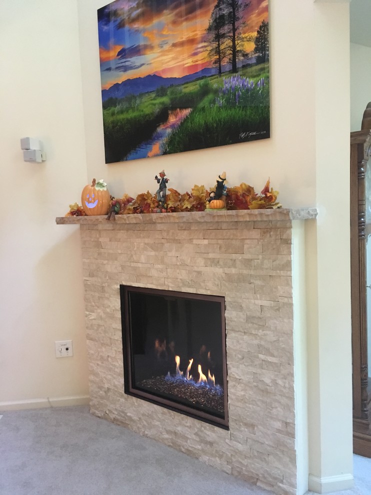 Mid-sized transitional open concept carpeted home design photo with beige walls, a standard fireplace and a stone fireplace