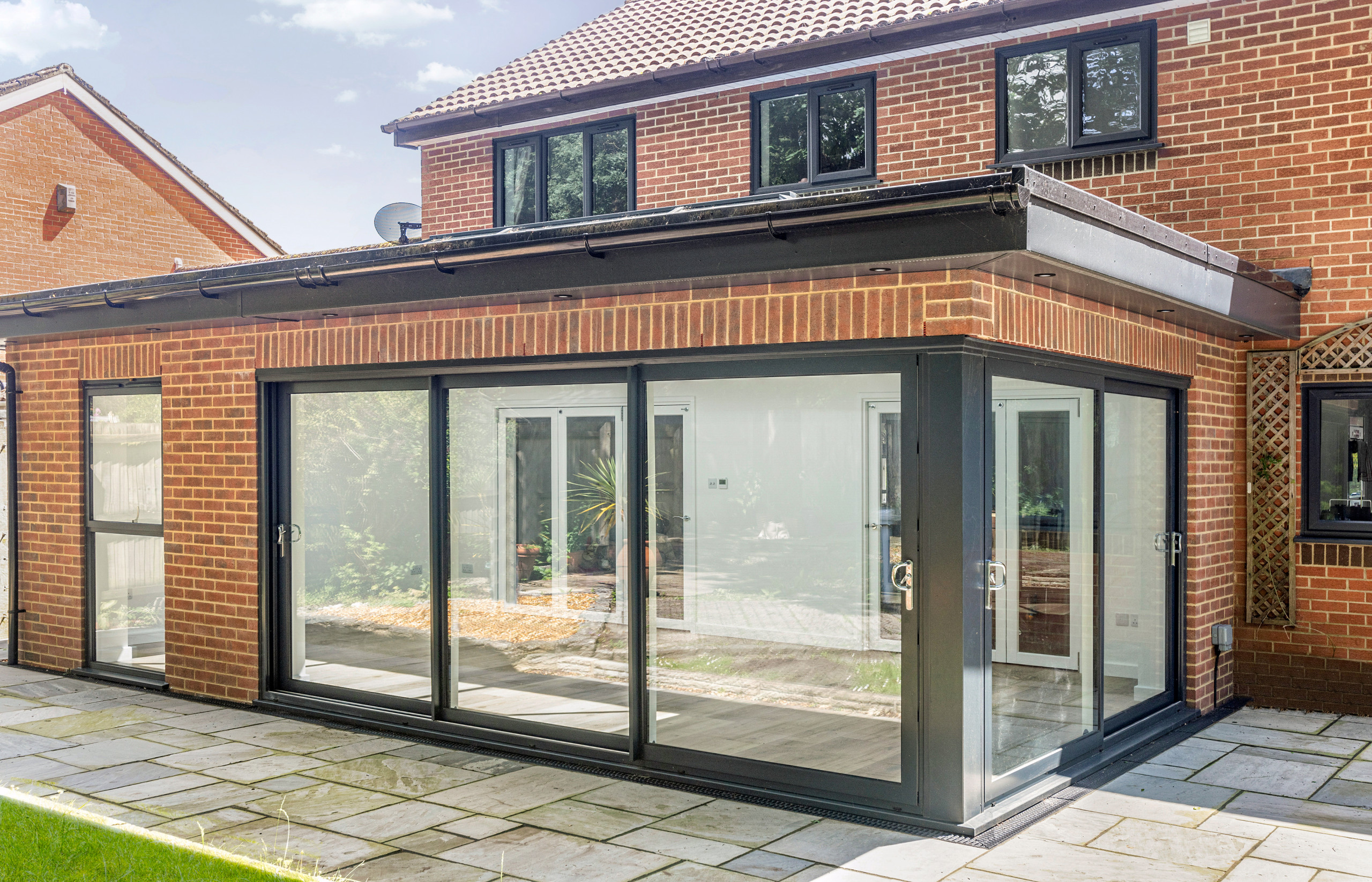 Exterior view of rear extension and sliding doors