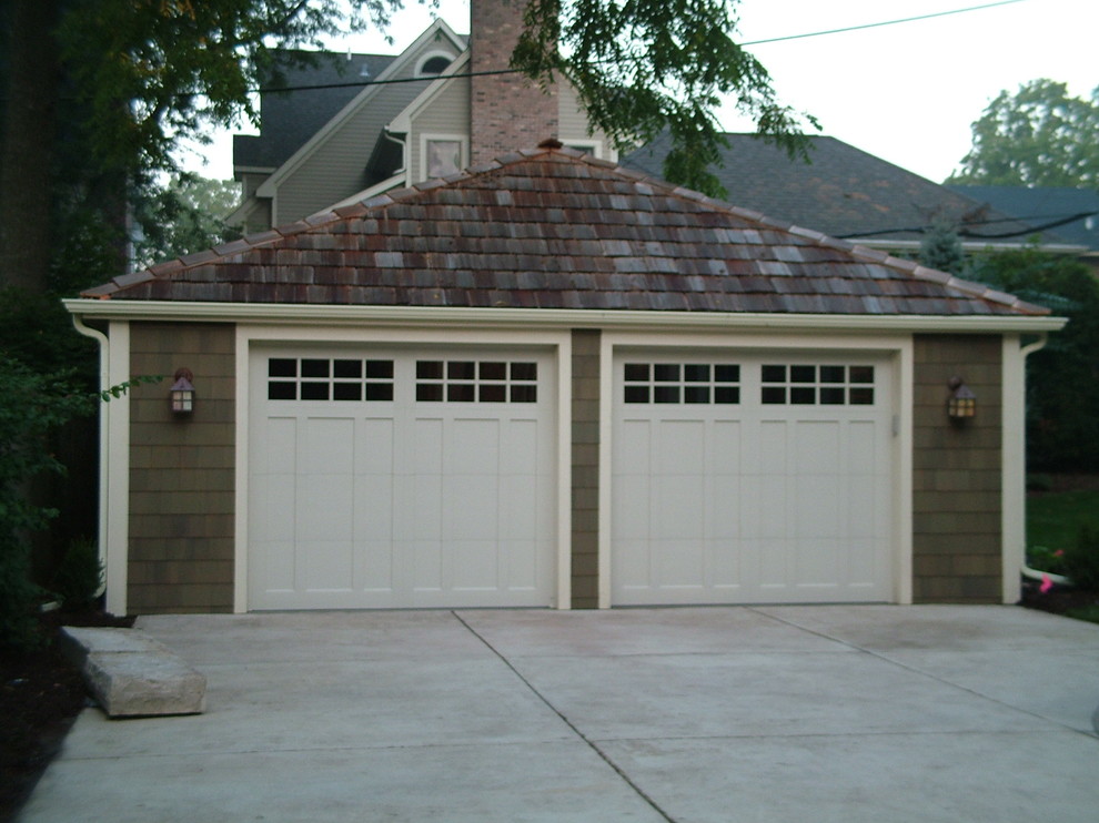 Design ideas for a mid-sized transitional detached two-car garage in Chicago.