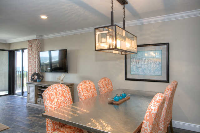 Design ideas for a beach style dining room in Tampa.