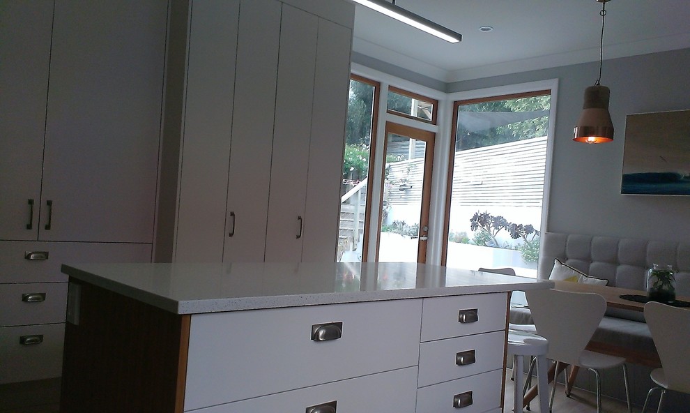 white and oak kitchen and dining room