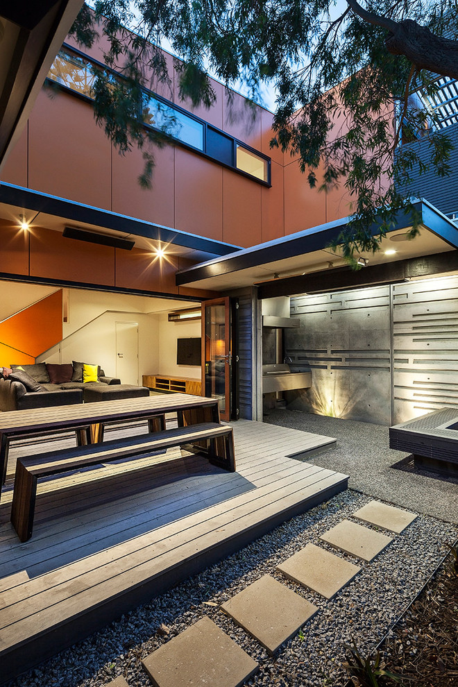 Inspiration for a large contemporary backyard patio in Melbourne.