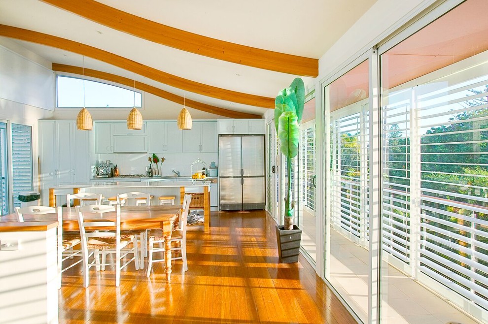 Inspiration for a beach style dining room in Sydney.