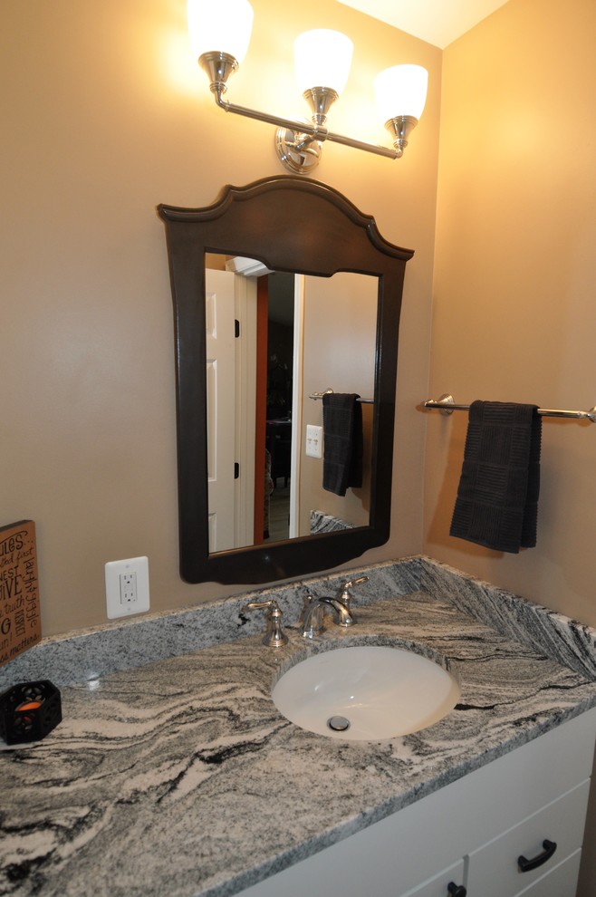 This is an example of a small modern bathroom in DC Metro.
