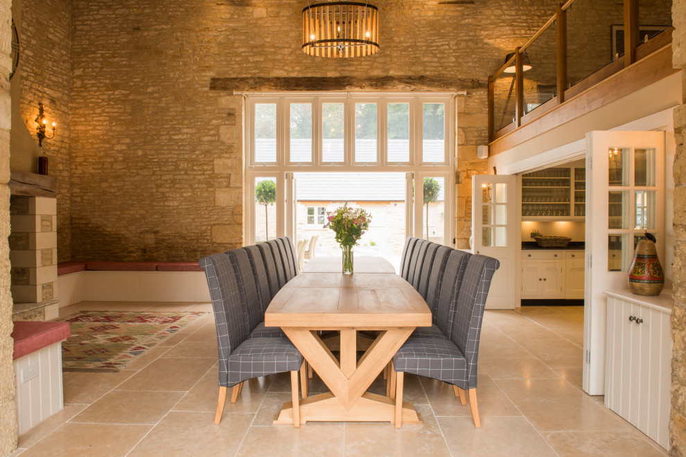 Photo of a large classic enclosed dining room in Gloucestershire.