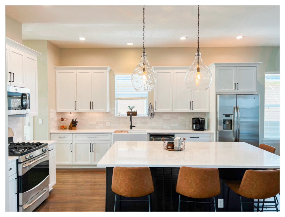 Example of a transitional kitchen design in Denver