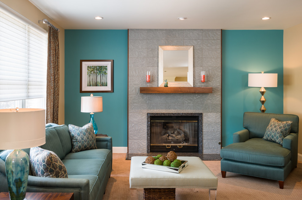 Large contemporary open concept family room in New York with carpet, a standard fireplace, a tile fireplace surround, no tv and multi-coloured walls.