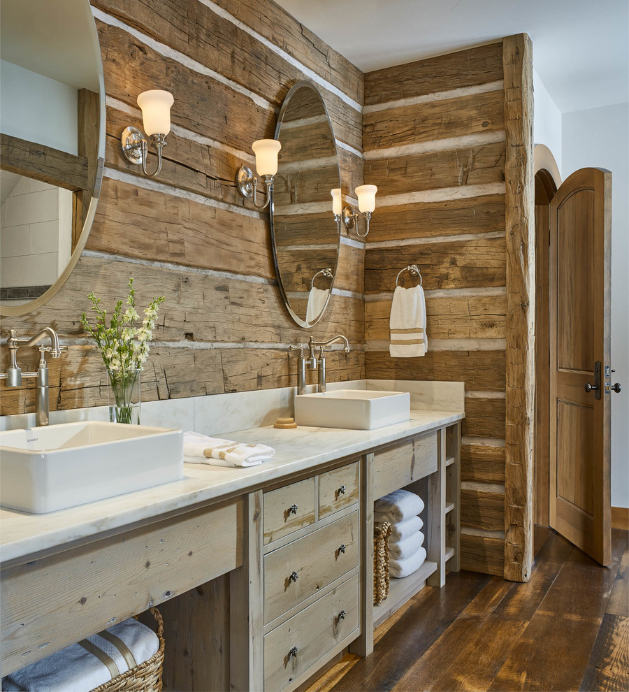 Inspiration for a country bathroom in Burlington with flat-panel cabinets, light wood cabinets, white walls, medium hardwood floors, a vessel sink, brown floor and white benchtops.