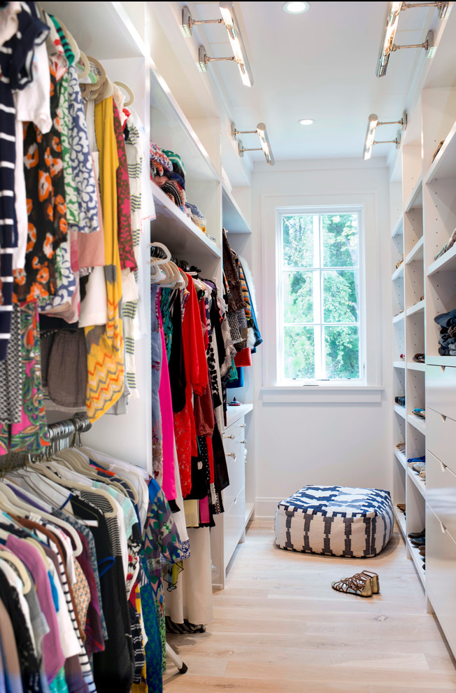 This is an example of a transitional storage and wardrobe in Raleigh.
