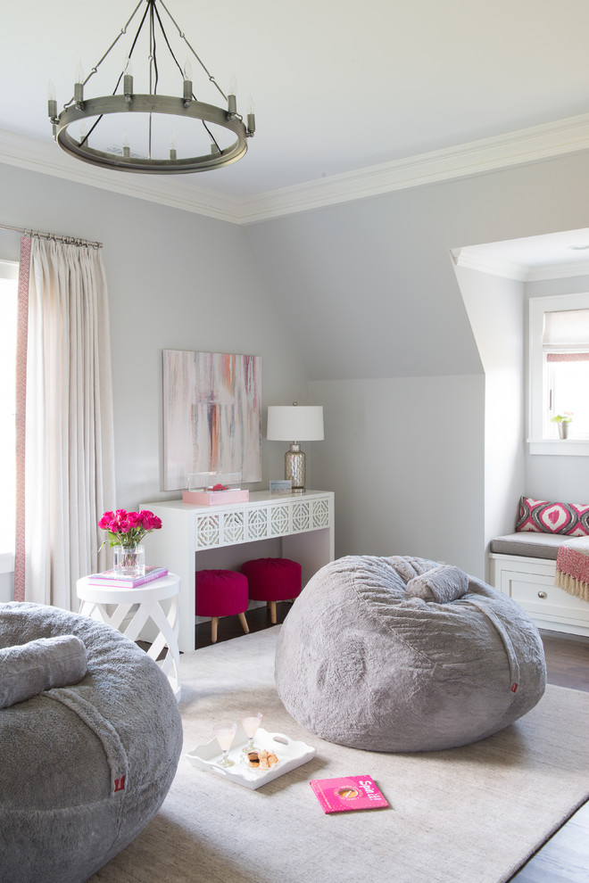 Inspiration for a mid-sized transitional kids' playroom for kids 4-10 years old and girls in DC Metro with grey walls, medium hardwood floors and brown floor.