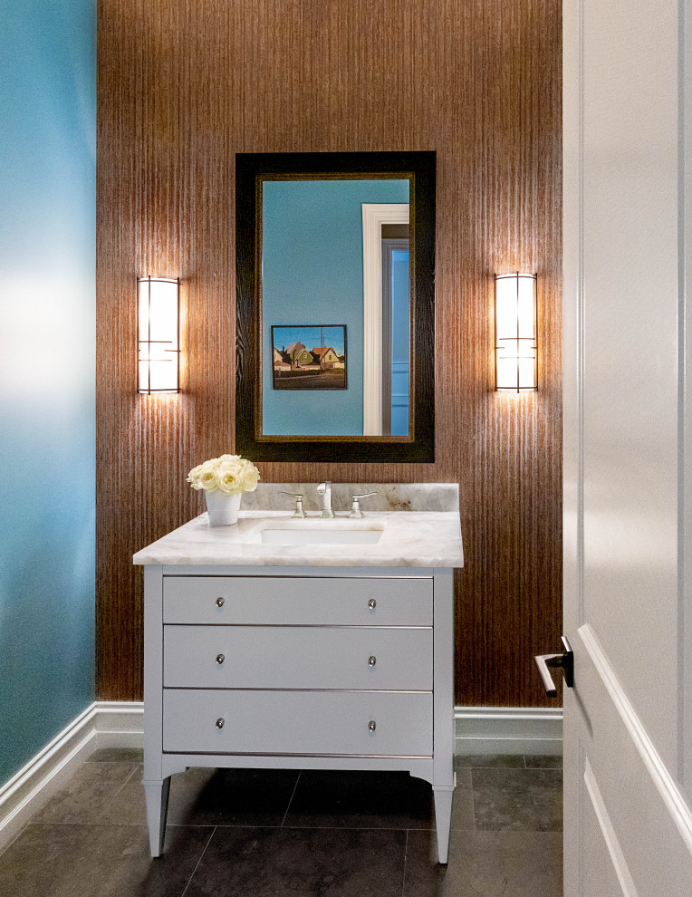 Photo of a medium sized traditional bathroom in Detroit with flat-panel cabinets, white cabinets, ceramic flooring, onyx worktops, grey floors, white worktops, a single sink, a freestanding vanity unit and wallpapered walls.