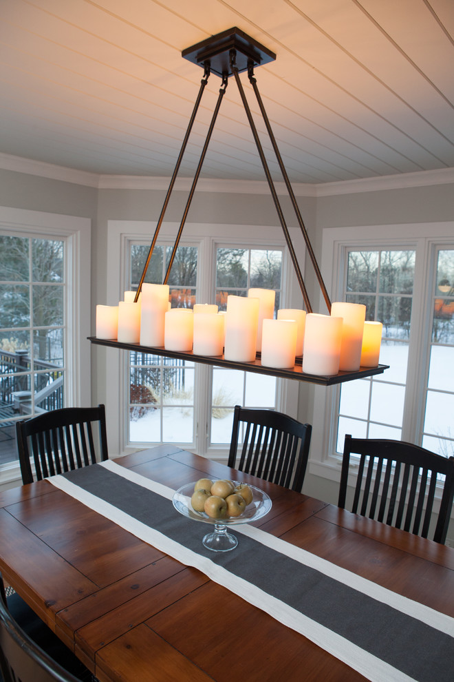 Example of a mid-sized transitional light wood floor kitchen/dining room combo design in Chicago
