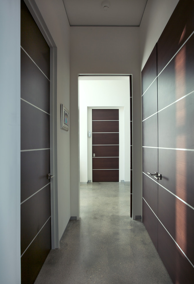 This is an example of a modern hallway in Miami.