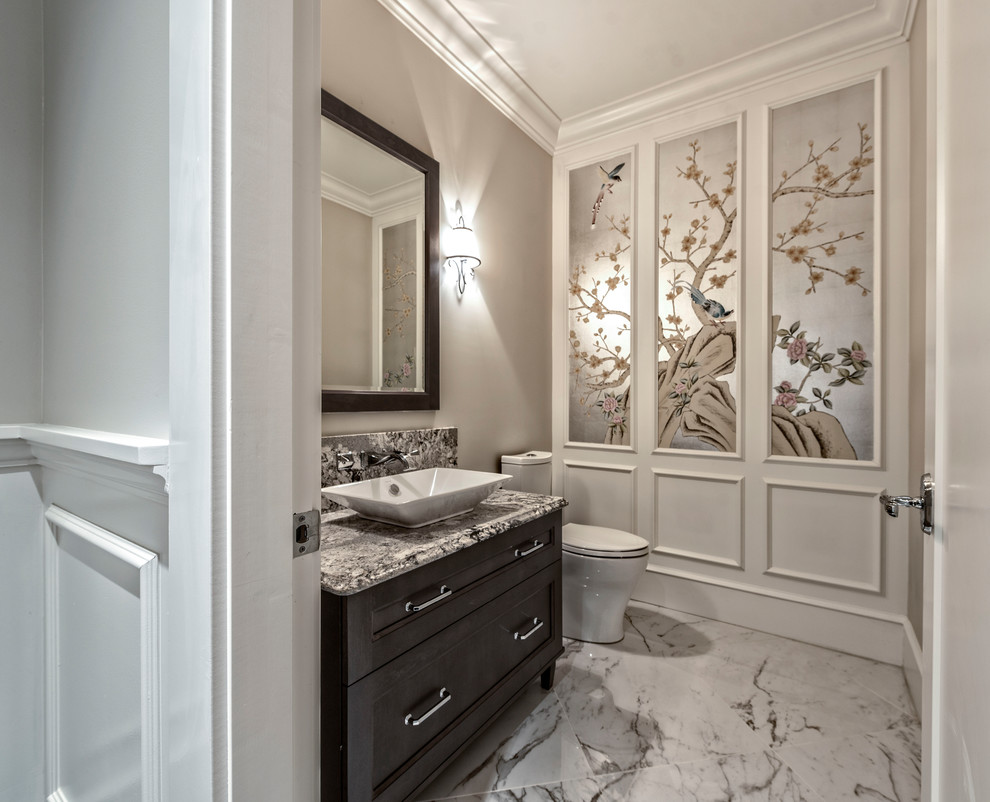 This is an example of a mid-sized traditional powder room in Vancouver with recessed-panel cabinets, brown cabinets, a one-piece toilet, beige walls, ceramic floors, a vessel sink, engineered quartz benchtops and multi-coloured floor.