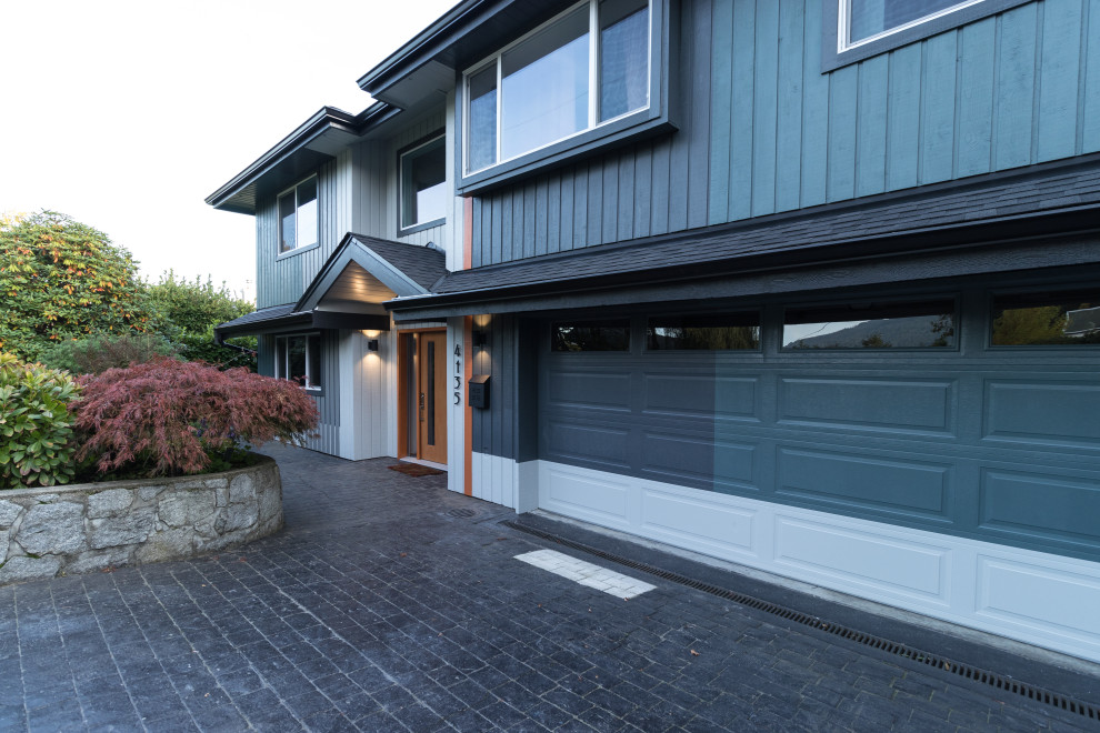 This is an example of a mid-sized eclectic garage in Vancouver.