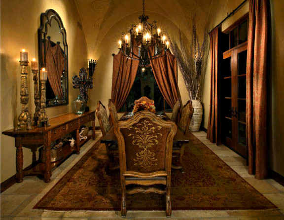 This is an example of a mediterranean separate dining room in Phoenix with yellow walls and travertine floors.