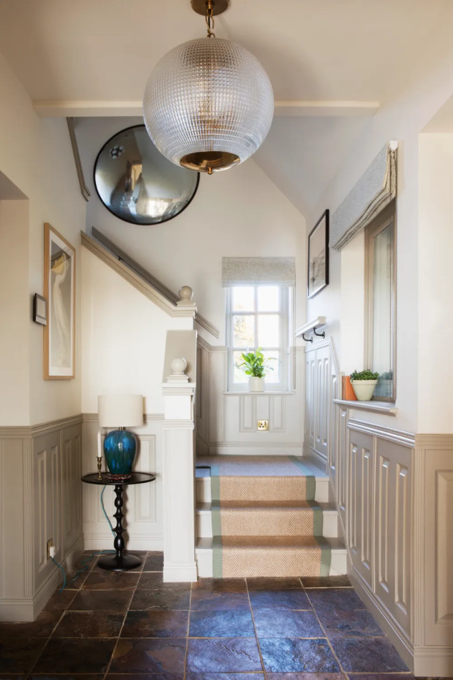 Photo of a transitional Painted Wood L-shaped staircase in Kent.