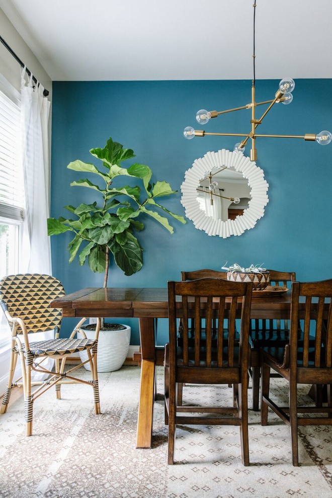 Dining room - transitional dining room idea in Charlotte with blue walls