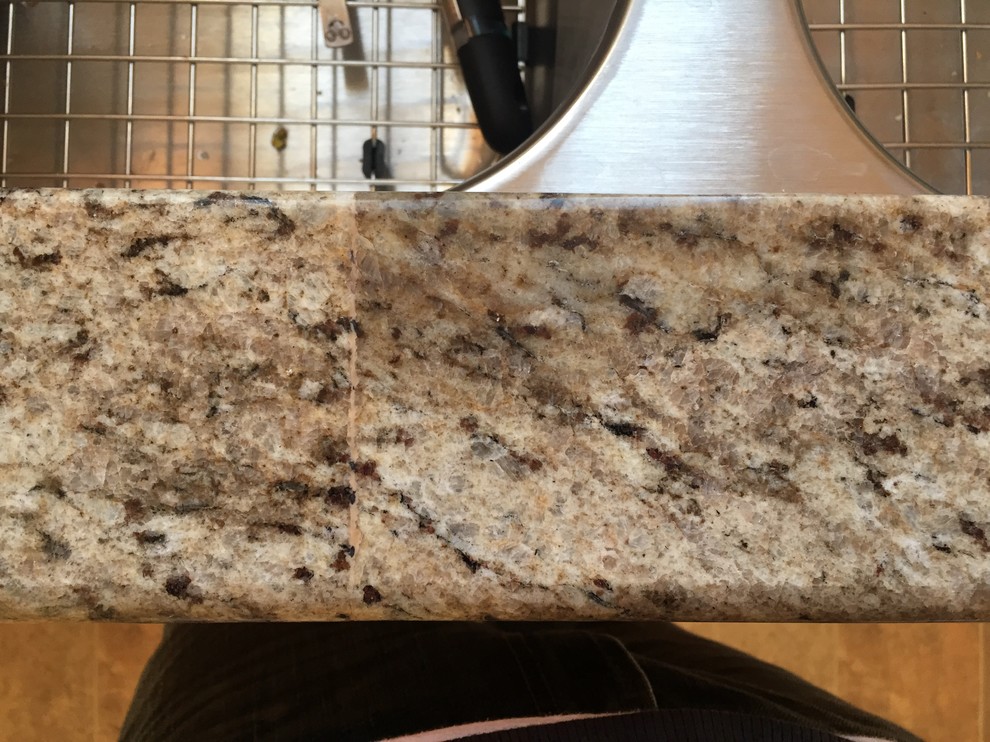 Dark spot on new granite
