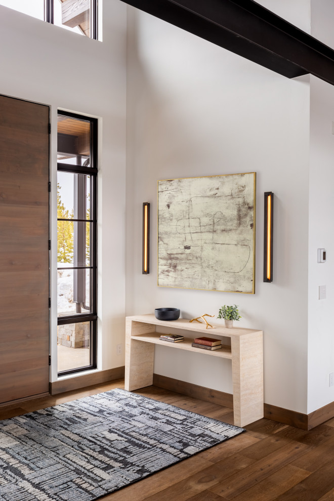 Inspiration for a rustic entryway remodel in Denver