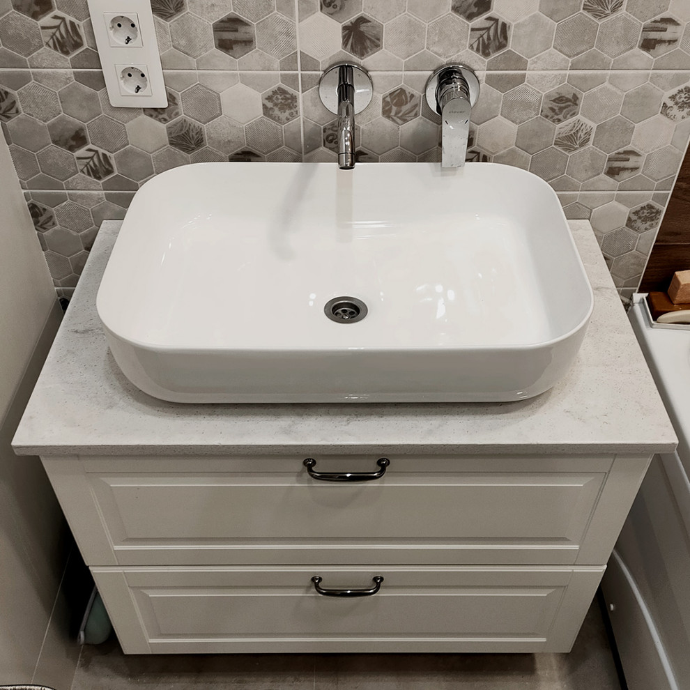 Design ideas for a small contemporary bathroom in Saint Petersburg with solid surface benchtops, grey benchtops, a single vanity and a freestanding vanity.