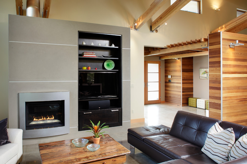 Photo of an expansive contemporary open concept living room in Sacramento with beige walls, concrete floors, a standard fireplace, a metal fireplace surround and a built-in media wall.
