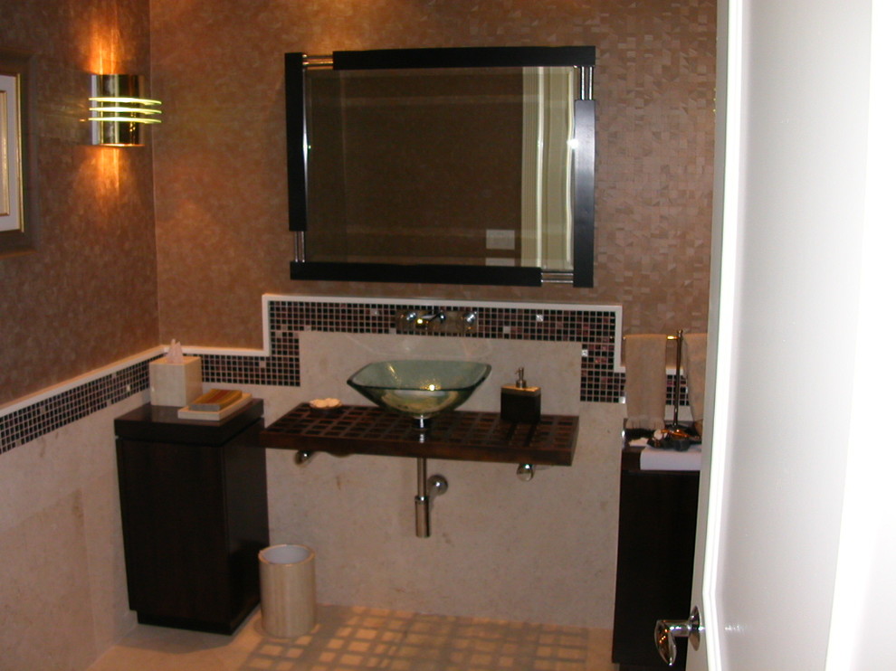 This is an example of a contemporary powder room in Miami.