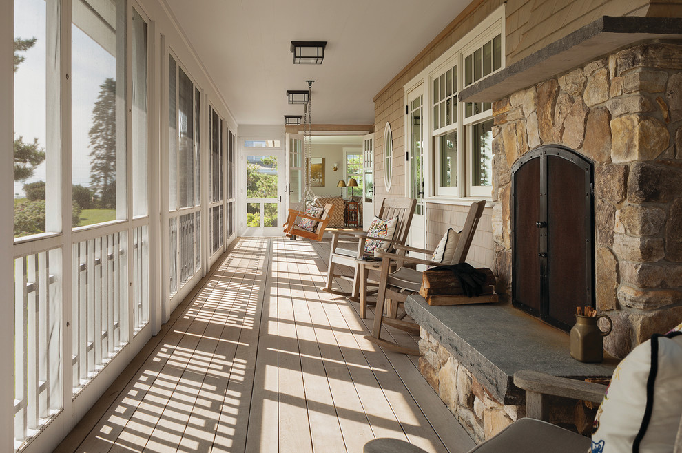 Inspiration for a large traditional side yard verandah in Other with a fire feature, decking and a roof extension.