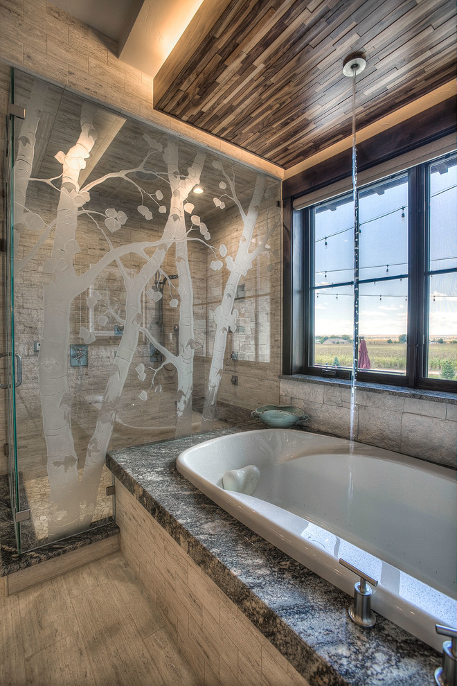 Expansive country master bathroom in Denver with flat-panel cabinets, medium wood cabinets, a drop-in tub, a corner shower, a two-piece toilet, beige tile, multi-coloured tile, ceramic tile, grey walls, slate floors, an undermount sink and granite benchtops.