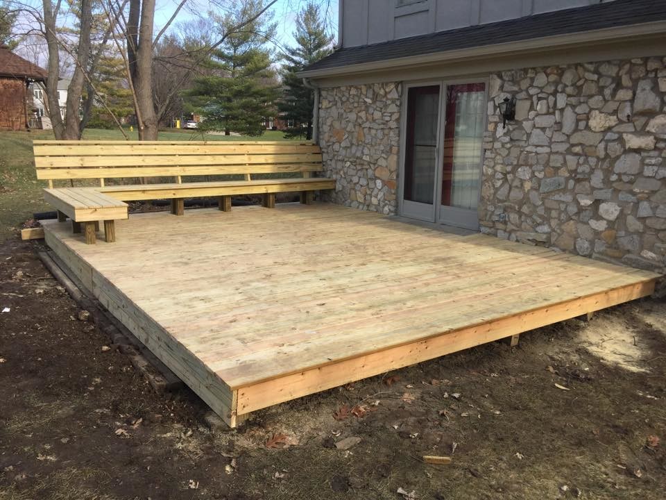 This is an example of a large backyard deck in Indianapolis with no cover.