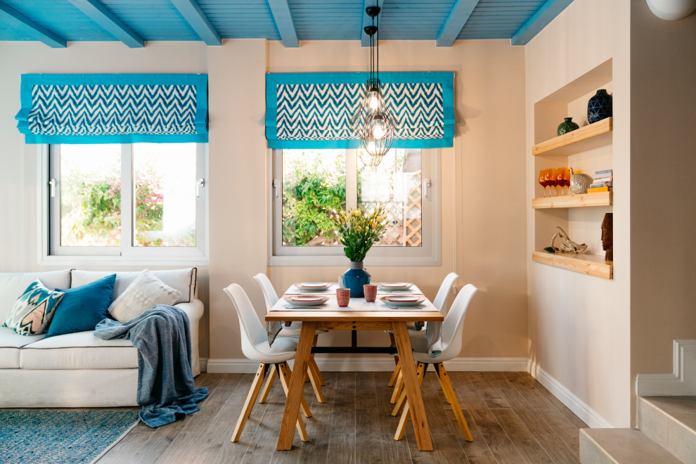 Inspiration for a mid-sized mediterranean open plan dining in Moscow with beige walls, medium hardwood floors and brown floor.