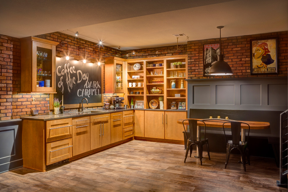 Traditional home bar in Kansas City with medium hardwood floors and beige floor.