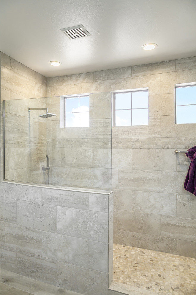 This is an example of a mid-sized transitional master bathroom in Phoenix with recessed-panel cabinets, dark wood cabinets, an alcove shower, a one-piece toilet, beige tile, porcelain tile, orange walls, porcelain floors, an undermount sink, granite benchtops, brown floor and an open shower.