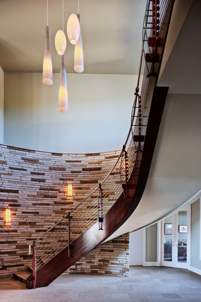 Mid-sized contemporary curved staircase in Austin.