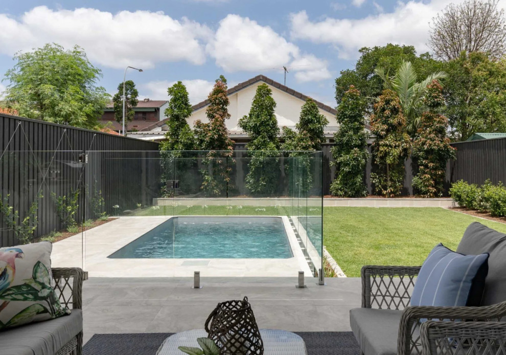 Inspiration for a small country backyard concrete and rectangular aboveground pool remodel