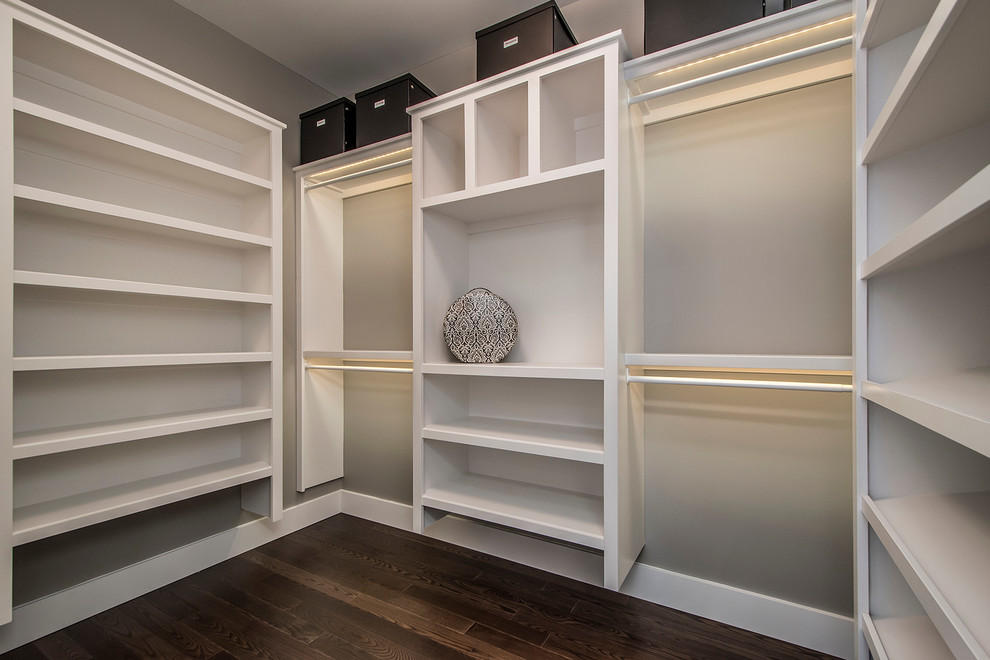 Large transitional gender-neutral walk-in closet photo