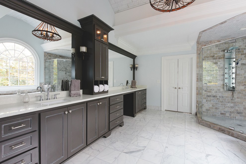 Inspiration for a large transitional master bathroom in Atlanta with an undermount sink, shaker cabinets, grey cabinets, engineered quartz benchtops, a freestanding tub, a corner shower, a two-piece toilet, white tile, subway tile, grey walls and marble floors.
