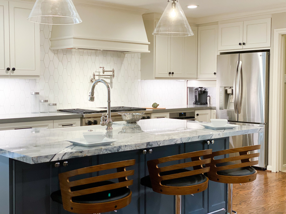 Transitional dark wood floor kitchen photo in Houston with a farmhouse sink, blue cabinets, white backsplash, ceramic backsplash, stainless steel appliances, an island and gray countertops