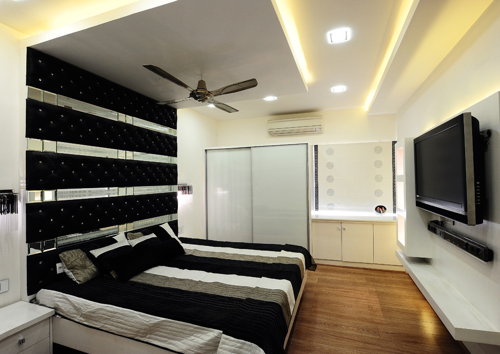 Example of a trendy bedroom design in Hyderabad
