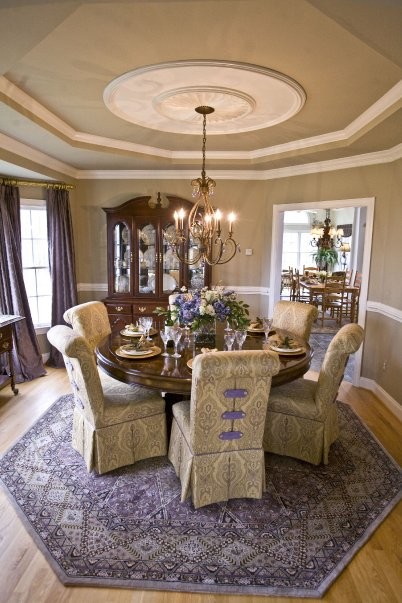 Mid-sized traditional separate dining room in Baltimore with beige walls, medium hardwood floors and no fireplace.